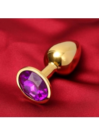 Золотистая анальная пробка с фиолетовым кристаллом - Сима-Ленд - купить с доставкой во Владивостоке