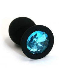 Чёрная силиконовая анальная пробка с голубым кристаллом - 7 см. - Kanikule - купить с доставкой во Владивостоке