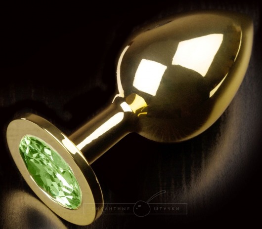 Золотистая анальная пробка с салатовым кристаллом - 9 см. - Пикантные штучки - купить с доставкой во Владивостоке