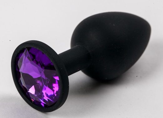 Черная силиконовая анальная пробка с фиолетовым стразом - 7,1 см. - 4sexdreaM - купить с доставкой во Владивостоке